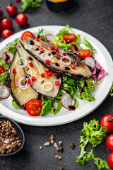 eggplant dish tomato, pepper, green leaves fried vegetable snack on the table copy space food background rustic top view