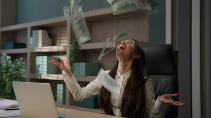 Business girl Caucasian surprised excited happy woman winner businesswoman holding cash laptop win throwing money rain celebration winning financial prize bonus promotion success at office bet profit - Powered by Adobe