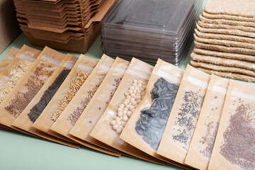 Fototapeta na wymiar Set for growing sprouts from seeds. Seeds, linen mats, boxes and lids