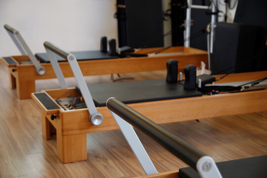 Pilates studio room with reformer beds