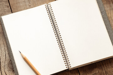 open notepad with blank pages, pencil for writing, space for text, retro style