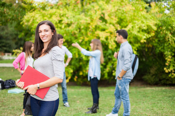 Student holding a book