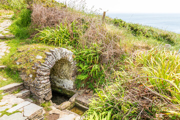 St Non's Well,  a holy well and shrine dedicated to the mother of St David at St Non's Bay on the St David's peninsula in the Pembrokeshire Coast National Park, Wales UK