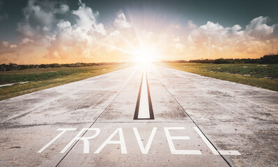 Conceptual image of a runway with the word travel written on it.