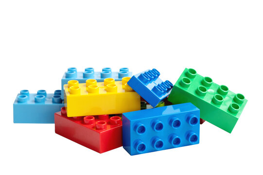Lego bricks. Educational children's toys for the little ones. Colorful plastic building blocks isolated on white background.