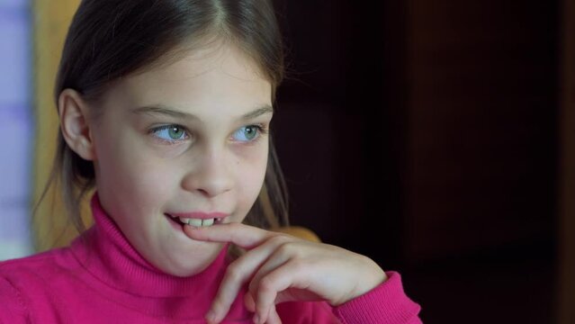 Beautiful girl sitting on chair ang thinking, 4k real time video footage