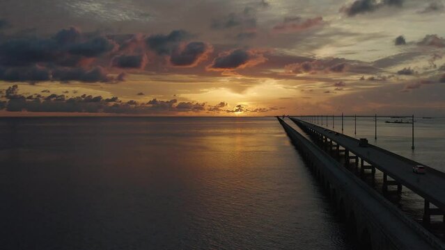 Panoramic view of sunrise in the Florida Keys landscape along Seven Mile Bridge - 4K Drone