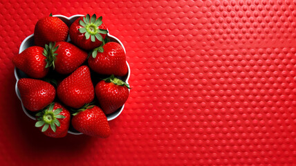 Minimalist red Strawberry background with copy space.