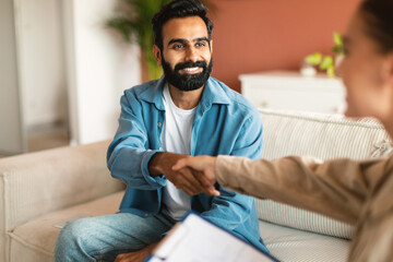 Arabic Man Client Handshaking With Specialist Advisor During Consultation Indoor