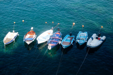 Small fishing boats moored in the harbour