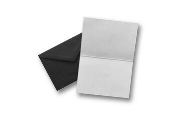 Black envelope with folded invitation or greeting card mockup isolated on white background. 3d rendering.