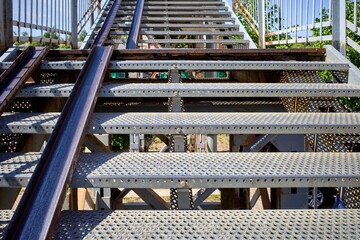 Air crossing over the road. Rails for wheelchairs.