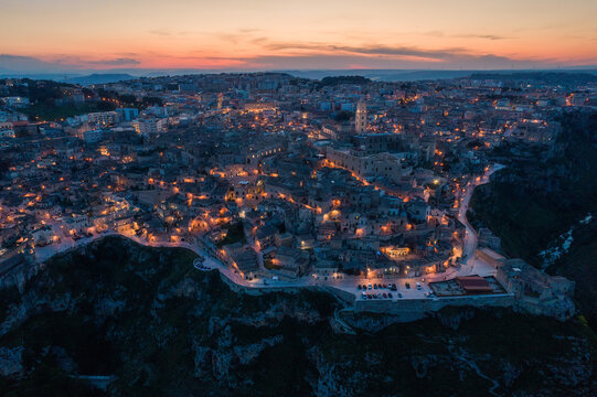 Aerial view of the ancient town of Matera at sunset, Matera, Italy © Sen