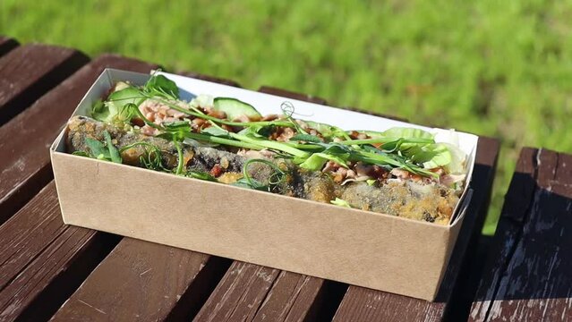 Chinese takeaway food - roll, rice, tuna and salad