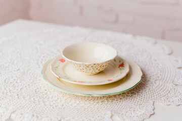 Closeup of porcelain plates and bowls