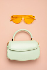 Flat lay with woman fashion accessories, bag and sunglasses. Fashion blog, online store...