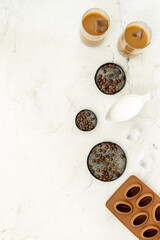 Two glasses of cold drew coffee drink with ice with coffee beans