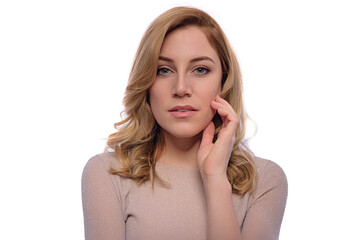 Attractive blonde woman posing on a white background.