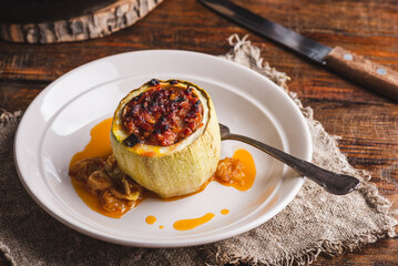Baked Zucchini Stuffed with Ground Meat and Greens