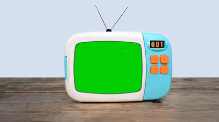 old blue plastic retro TV with buttons with blank green screen for designer, video film stands in light room on vintage wooden table, concept of cozy house 1960-1970, stylish mockup