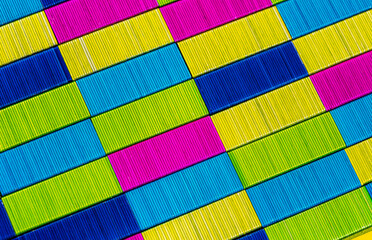 Multicolored office metal staples background