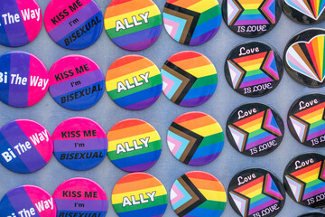 Variety of Pride pins for sale at Pride festival.