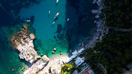 Aerial drone shot of ocean with boats