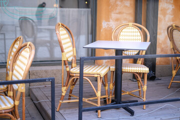 Summer terrace of the restaurant on a clear day. Table near the restaurant close-up