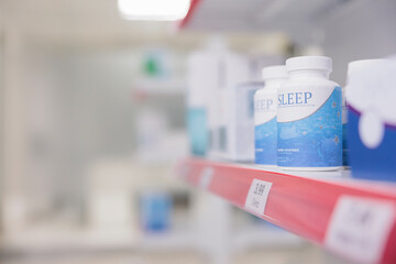 Health care facility shelves filled with medicaments and pharmaceutical products to sell prescription medicine or treatment to customers. Empty pharmacy with supplements and vitamins, pills bottles.