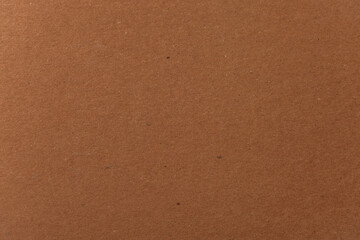 Kraft paper texture. Carton background. Blank sheet of brown kraft paper