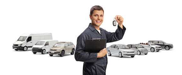 Car mechanic holding a clipboard and car key
