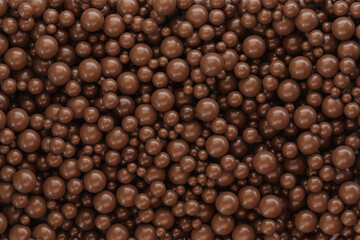 Lots of chocolate balls for making dessert. Texture with chocolate balls.
