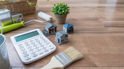 電卓と塗装道具│リフォーム・塗装業者・DIY　見積りイメージ