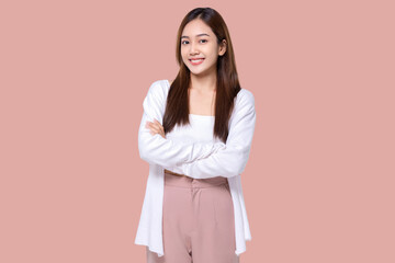 Beauty Asian woman making crossed arms isolated on pink background.