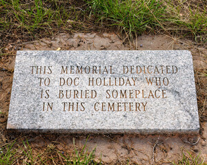 Granite marker indicating the memorial to Doc Holliday 
