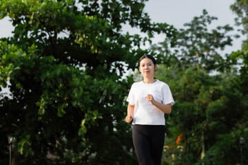 Asian young women running outdoors, healthy lifestyle, and sports concepts