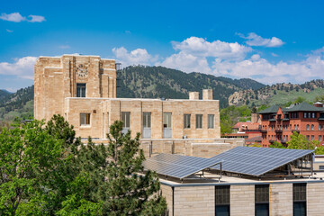 Boulder City Hall against the backdrop of the Rocky Mountains in Colorado. Solar panels on building...