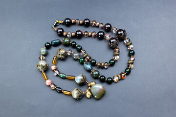Unique colorful gemstone necklace, handmade jewelry concept, promotional photo for an online jewelry store