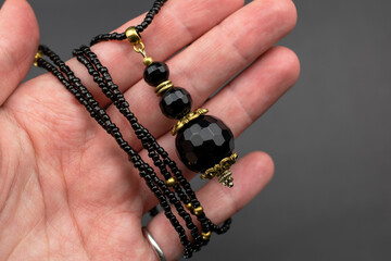 Unique gemstone necklace, handmade jewelry concept, promotional photo for an online jewelry store