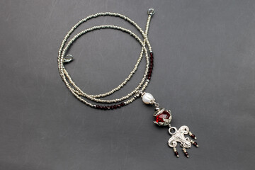 Fototapeta na wymiar Unique gemstone necklace, handmade jewelry concept, promotional photo for an online jewelry store