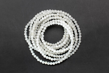 White gemstone necklace, handmade jewelry concept, promotional photo for an online jewellery store	