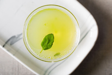 Boozy Gin Basil Smash cocktail gin, lemon juice, syrup and basil leaves