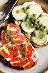 Healthy cucumber and tomato toast.