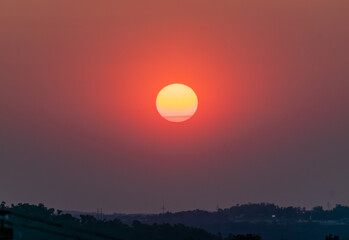 Hazy sunset Pittsburgh, PA caused by 2023 Canadian wildfires