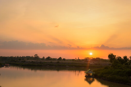 Sunset day with beautiful orange sky twilight weather. © Subhakitnibhat