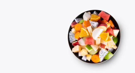 hand of human holding mixed fruits in white plate isolated on white background - healthy food style