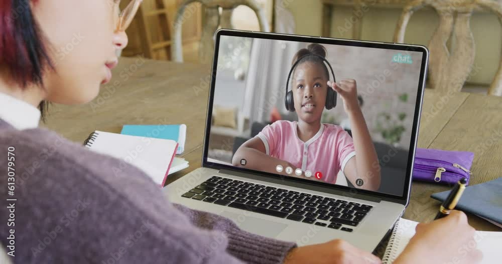 Poster Asian female student using laptop for video call with african american schoolgirl on screen