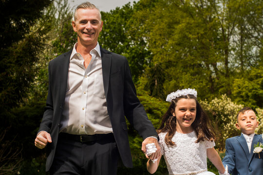 Portraits of the twins first holy communion