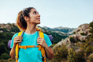 Female hiker relaxing after walk