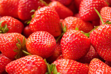 Fresh organic red strawberry fruit background